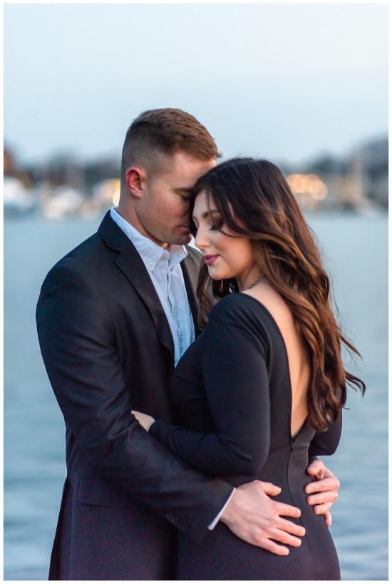 Formal engagement session outfit inspiration in Washington DC. She is wearing a black gown with a low back and he is dressed in a suit