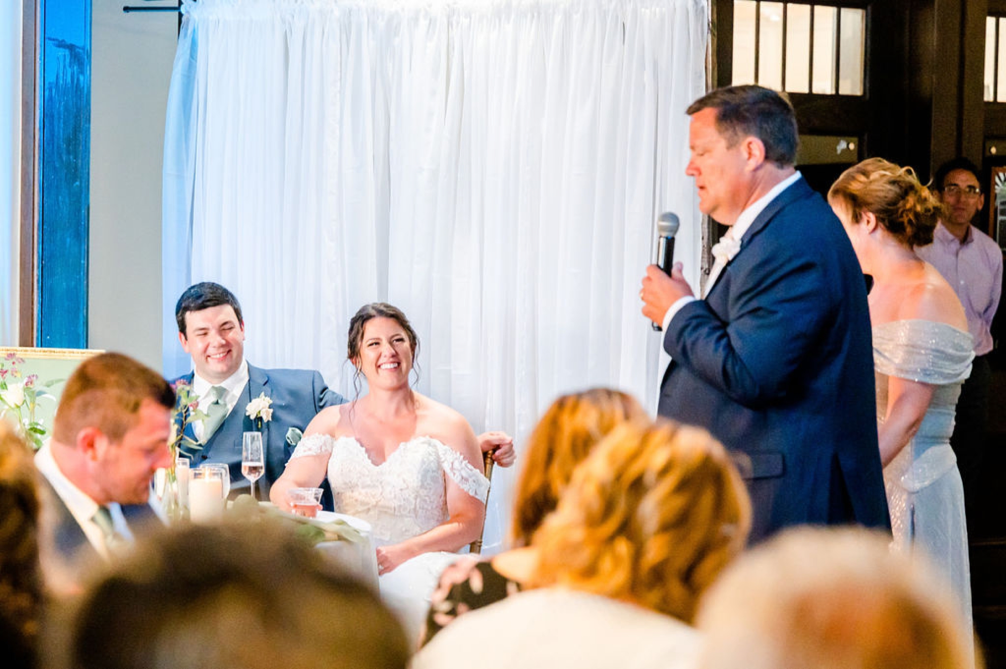 dad gives speech during Delaware wedding reception