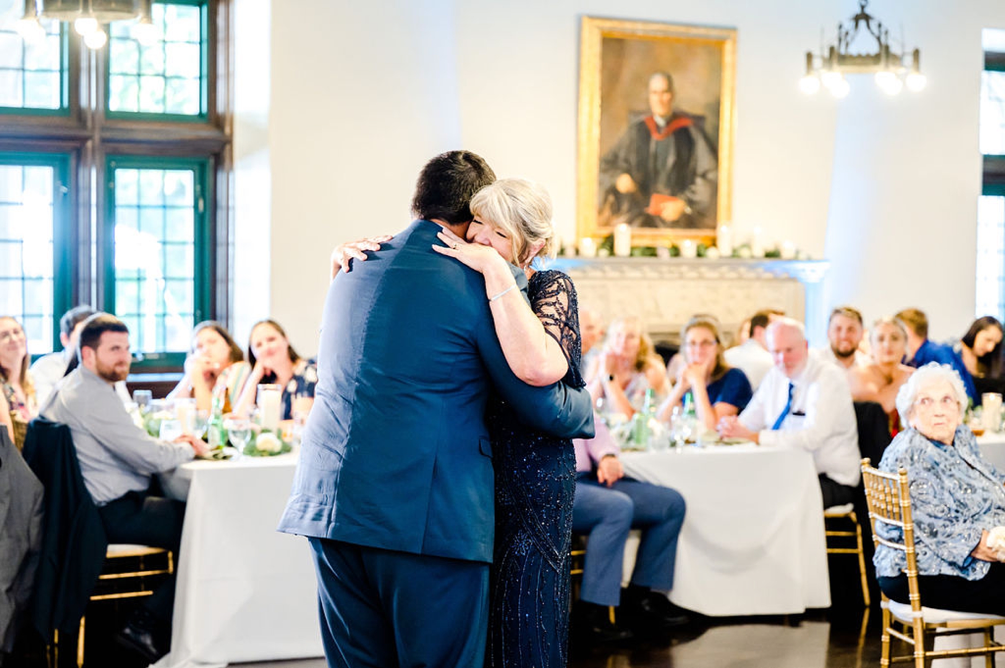 groom and mom dance during Delaware wedding reception