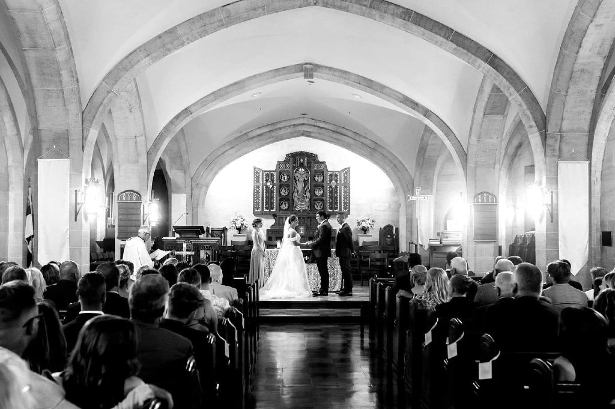 bride and groom at altar during traditional church wedding at Saint Andrews in Delaware