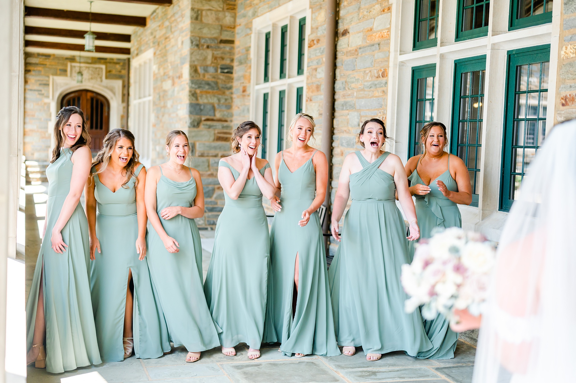 bridesmaids react to seeing bride in wedding dress