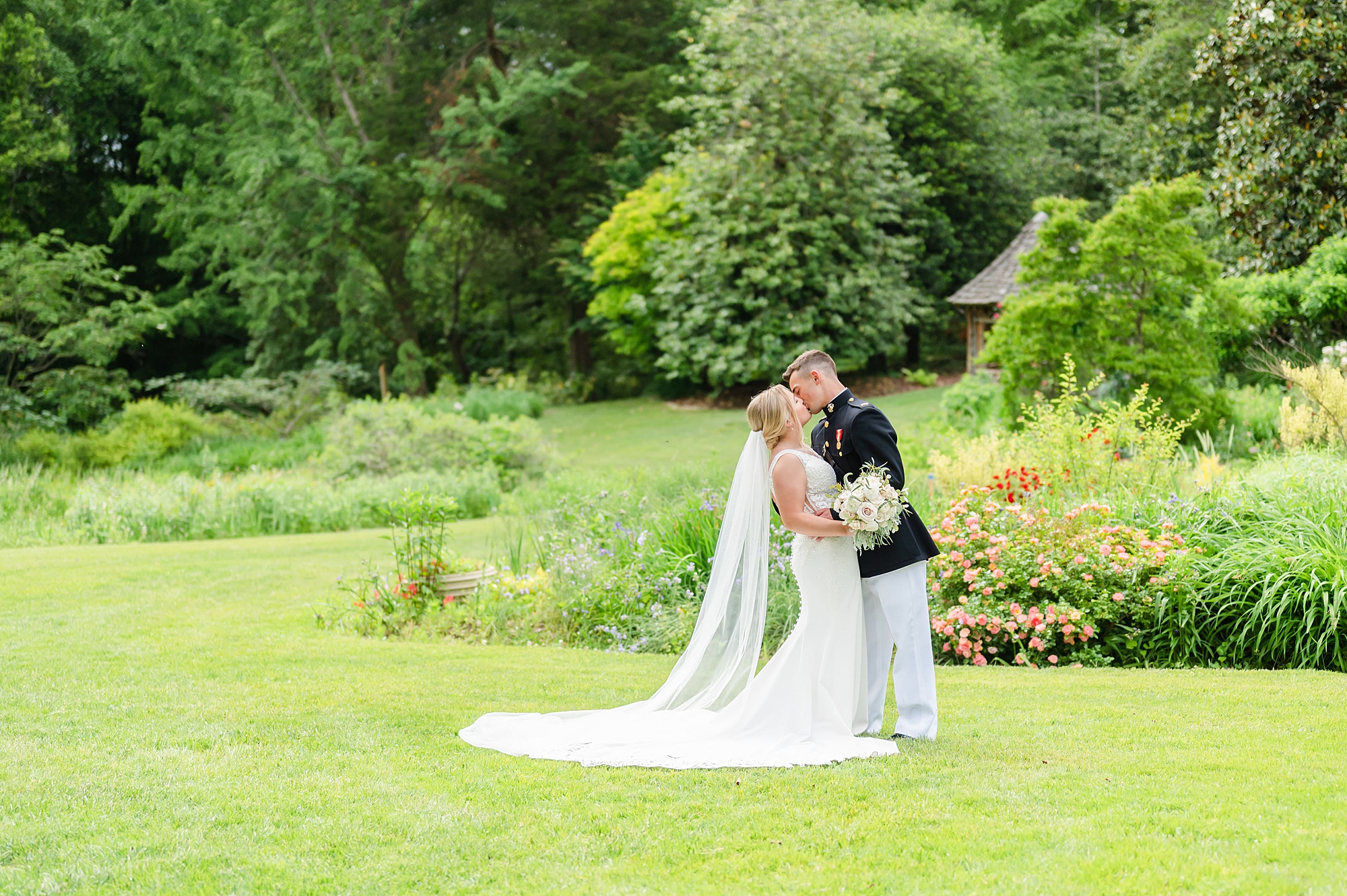 bride and groom kiss in Londontown Gardens