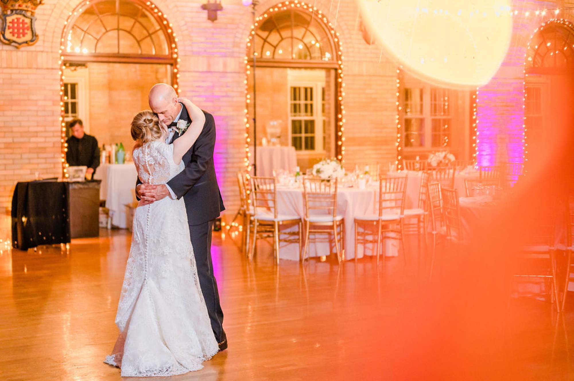 newlyweds dance together during DC wedding reception