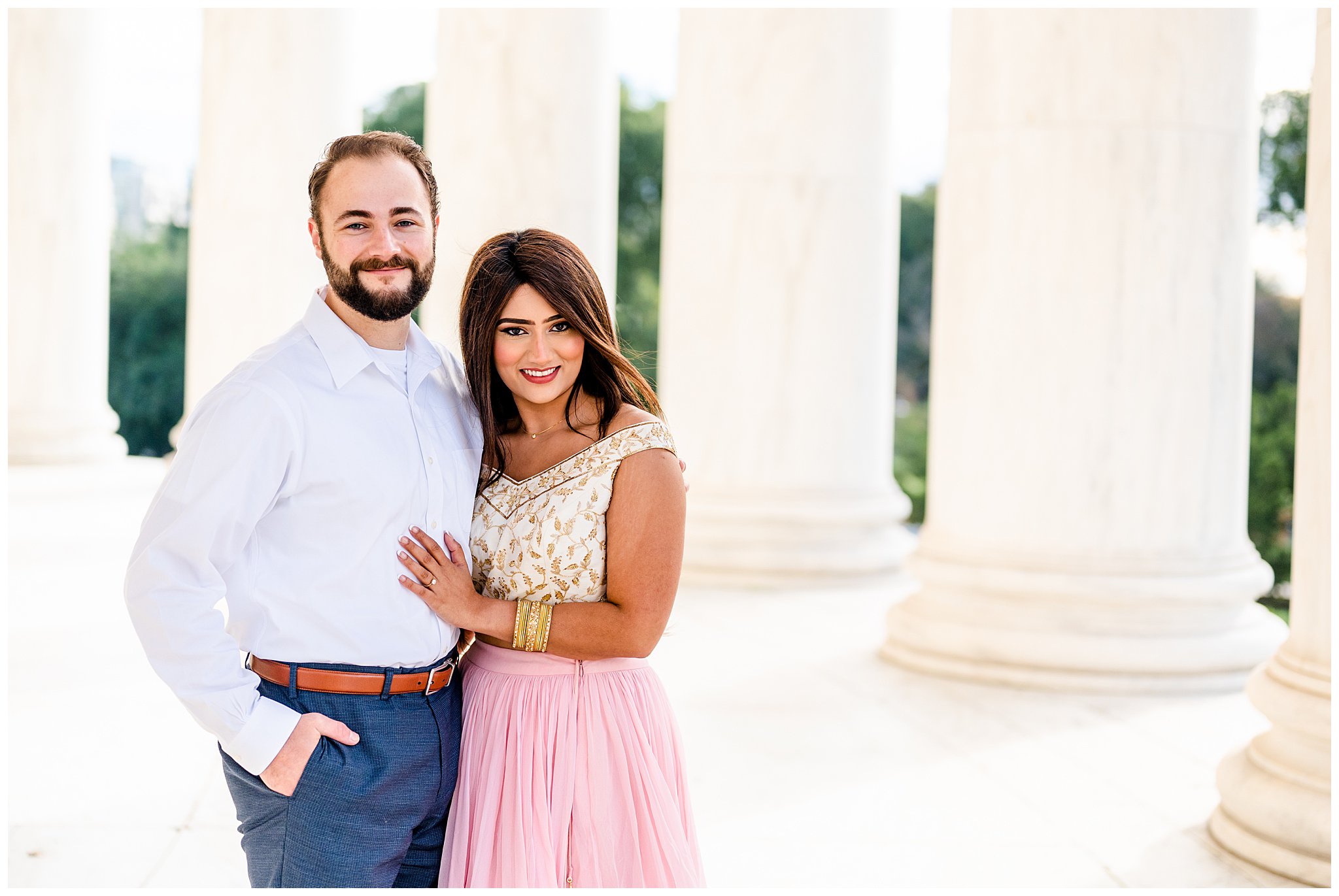 bride in Indian dress hugs groom during Jefferson Memorial engagement session